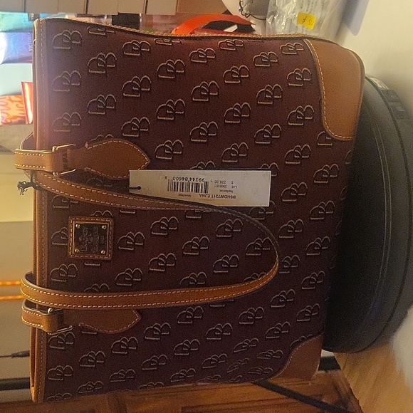 Dooney & Bourke Other - Dooney & bourke rose black gold same size to mustard